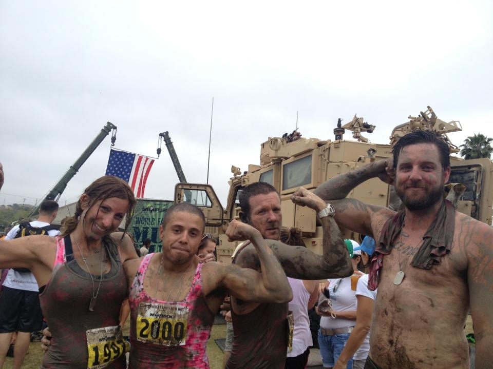 Employees testing their skills at the annual mud run at Camp Pendleton