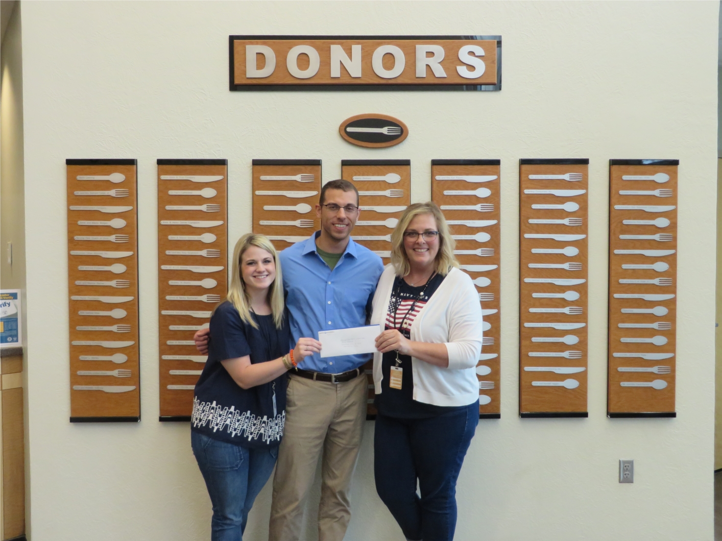 Employee-owners donated funds to the Regional Food Bank of Oklahoma and volunteered to sort and repackage food for families in need.