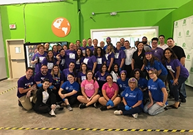 A group of Hyatt colleagues participating in community service and giving back at Clean The World 