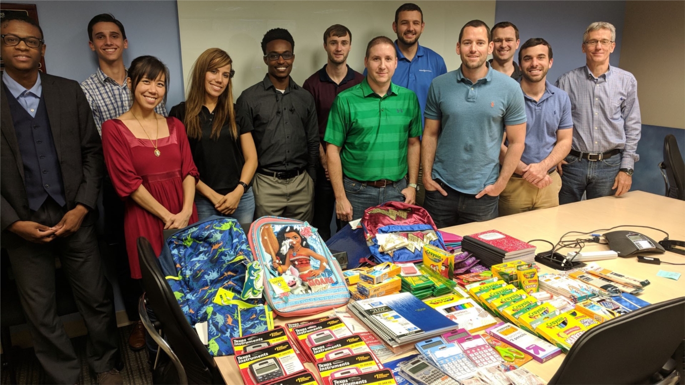 Employee-owners participating in a back-to-school supply drive for the Children's Home Society of Florida
