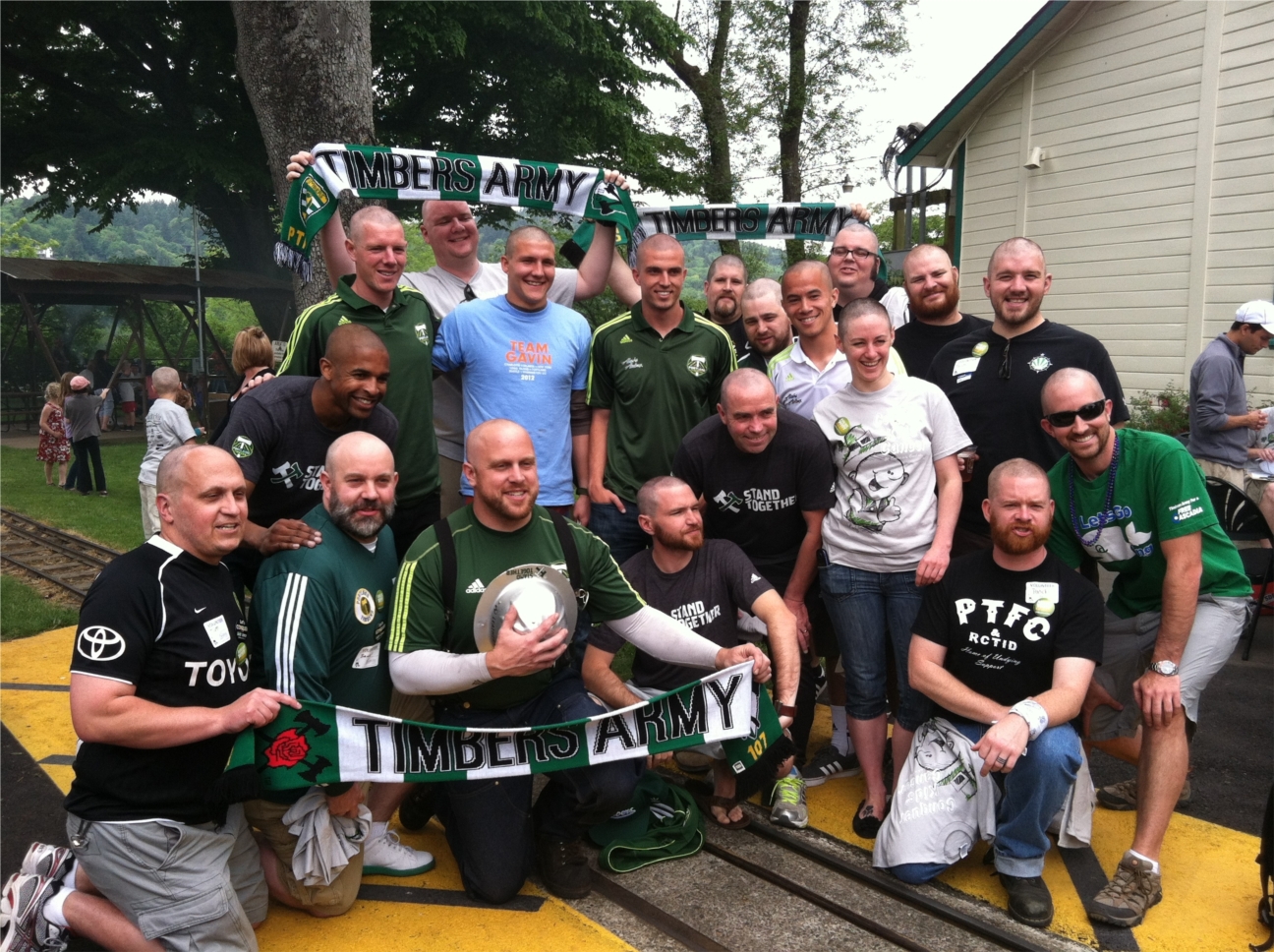 Staff members volunteer at community events including shaving their head with St Baldrick’s 