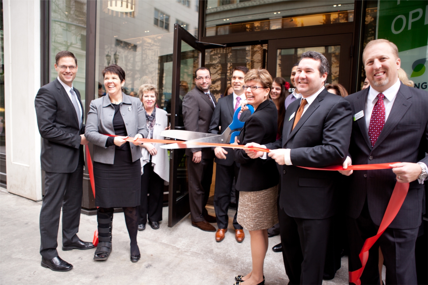 Employees celebrate the grand opening of Sterling Bank's new downtown Portland branch.