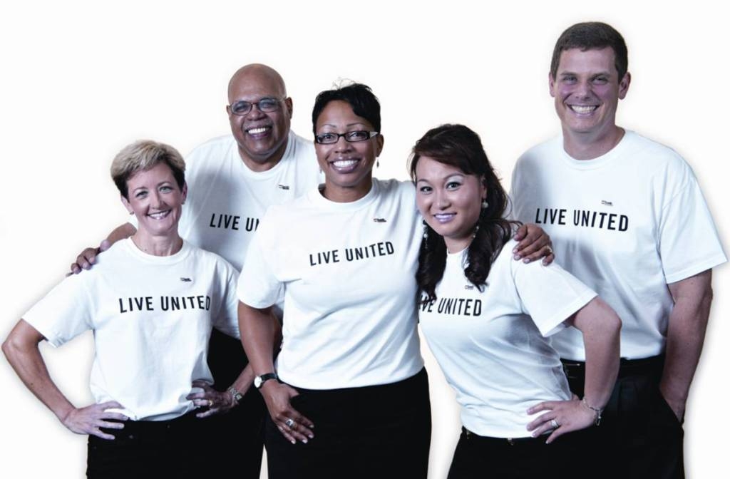 Malia Wasson (far left), president of U.S. Bank in Oregon and Southwest Washington, and some local market leaders show the bank's support for United Way.