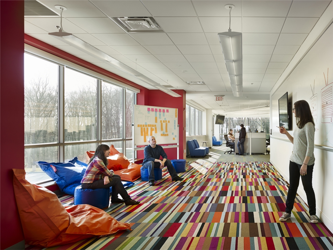 AWeber’s headquarters is the epitome of flexibility. Large windows provide abundant daylight and views to 100% of workstations. Spread throughout the open work areas is playful furniture, over 3,500-square-feet of writable wall surface, and informal gathering spaces to promote interactions that nurture teamwork and innovation.