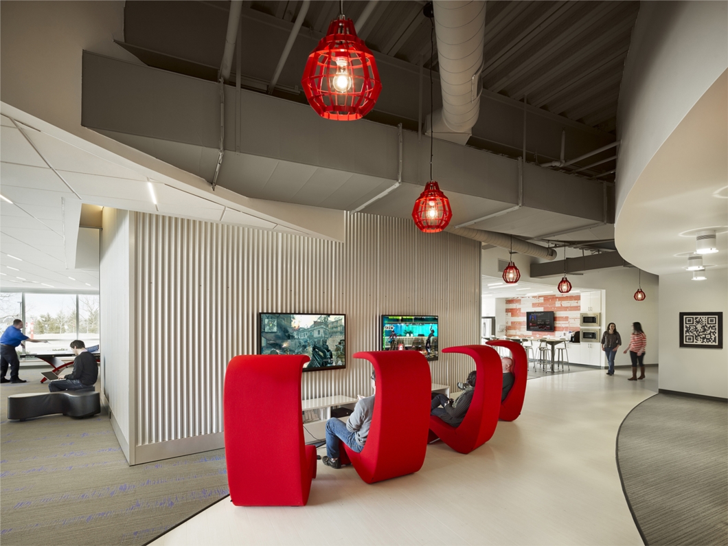 The ultimate design goal was to facilitate AWeber’s fifth core value, “Don’t Take Ourselves Too Seriously; Have Fun”, while also providing an environment where talented team members can work hard and achieve outstanding results. Game areas were integrated into the office for team building and relaxation, including two movie theaters, four video game stations, a pool table, table tennis, foosball and vintage arcade games. 