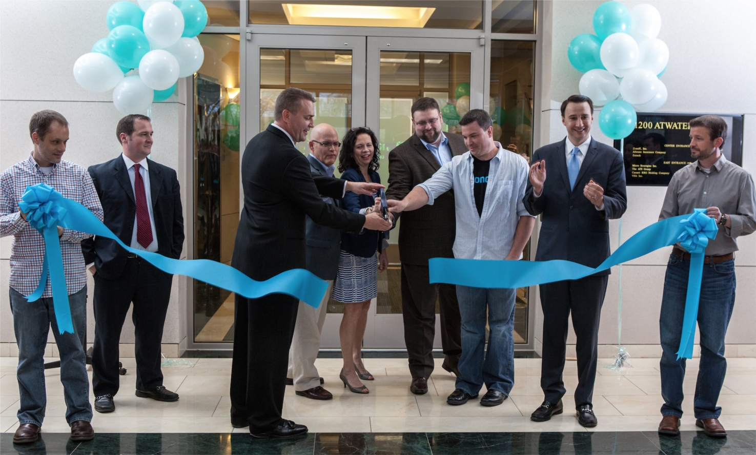 Ribbon cutting ceremony at Zonoff's new offices