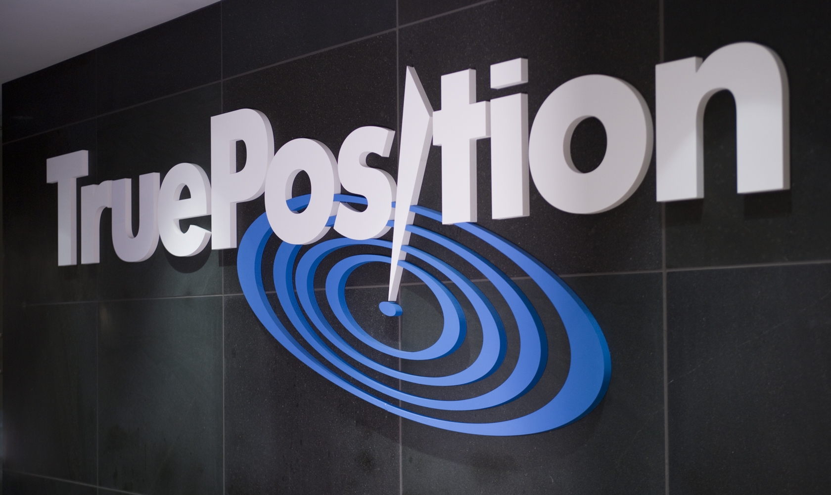 The TruePosition logo dominates the second floor training area in their corporate headquarters in Berwyn, Pennsylvania.