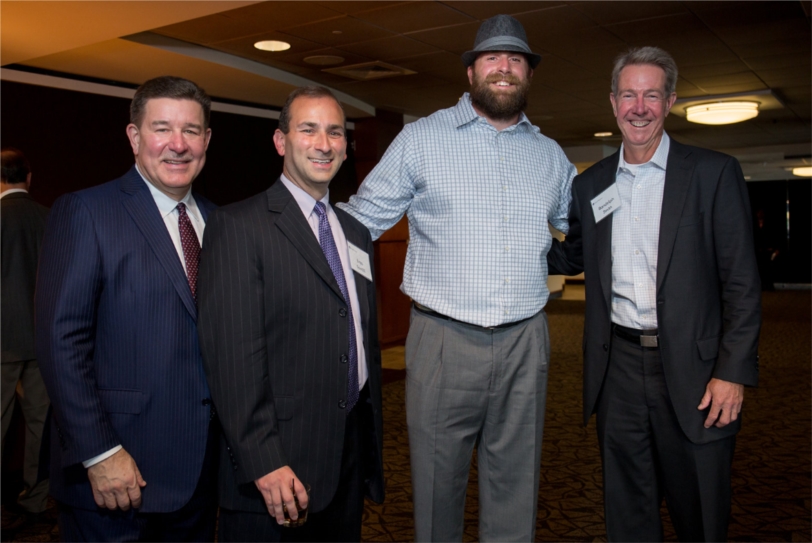 Grant Thornton staff and leaders recently mixed and mingled with Pittsburgh Steelers Pro-Bowler and Super Bowl champion Brett Keisel at an event at Heinz Field. (L to R) CEO Mike McGuire, Pittsburgh Office Managing Partner Enzo Santilli, Brett Keisel, Tax Partner Randolph Smith).
