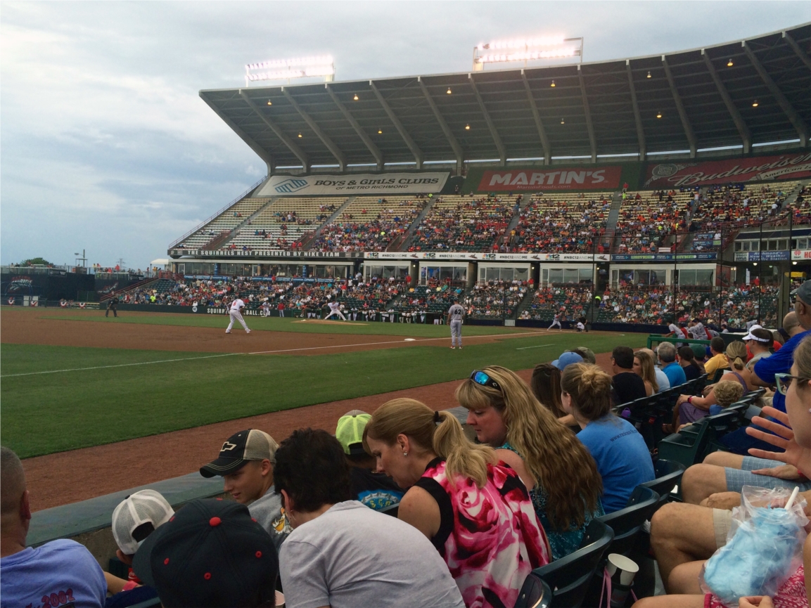 W. M. Jordan's Richmond staff and their families enjoy a Flying Squirrel's baseball game together.