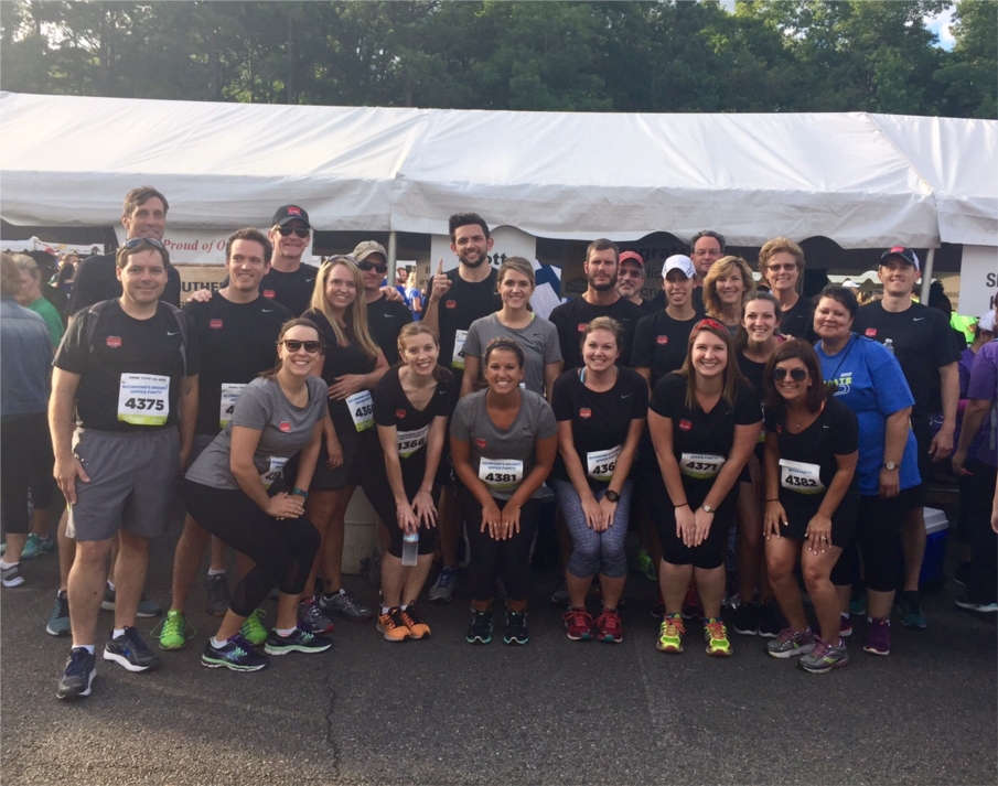 Scott colleagues, clients, friends and family participate for the third year in the Corporate 4-Miler. 