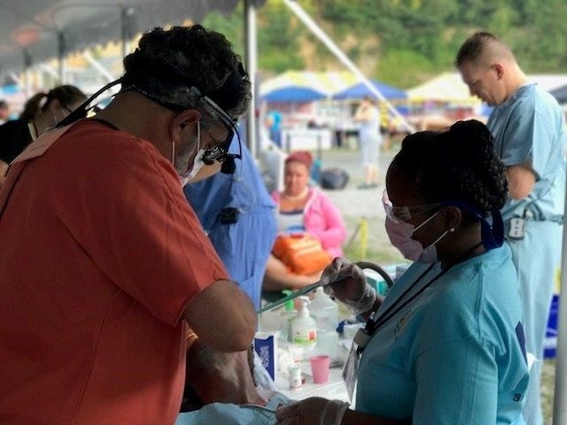 Dr. Greg Zoghby and Surgical Assistant Tenicia participating in the Wise County Mission of Mercy Project