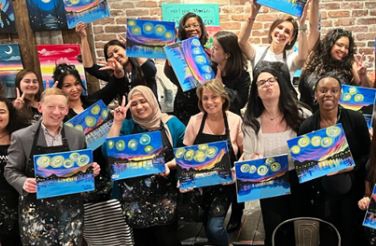 Team member bonding at a painting night out