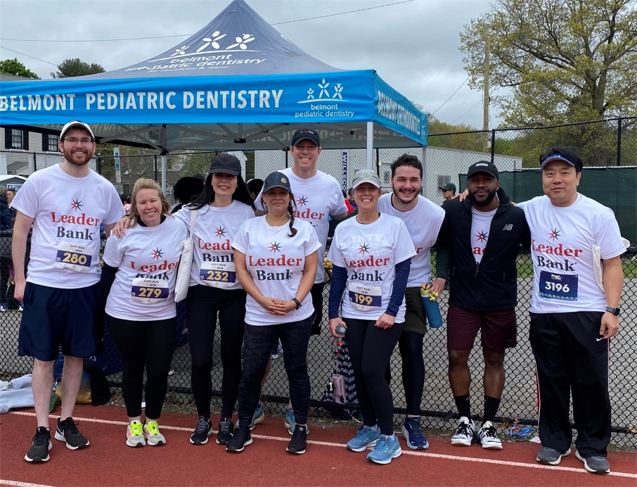 Team members participating in a 5k for charity