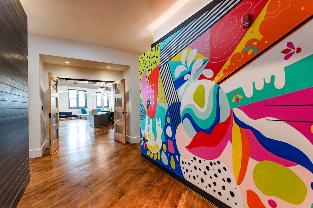 Our bright, vibrant mural welcomes everyone to the SingleStone office.