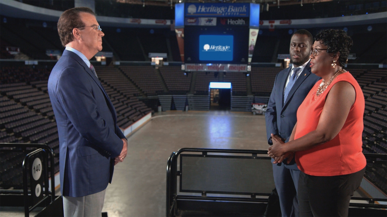 Rob Braun Interviewing Customers At Heritage Bank Center.jpg