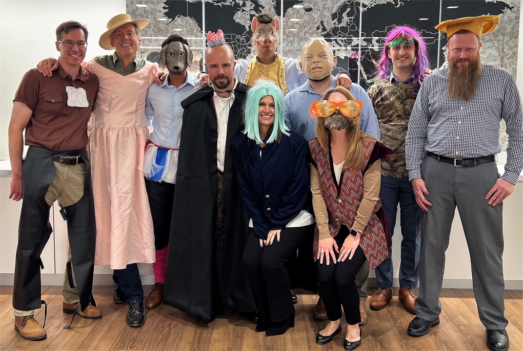 To raise money for a local charity, employees bid on costumes to "dress the bosses"