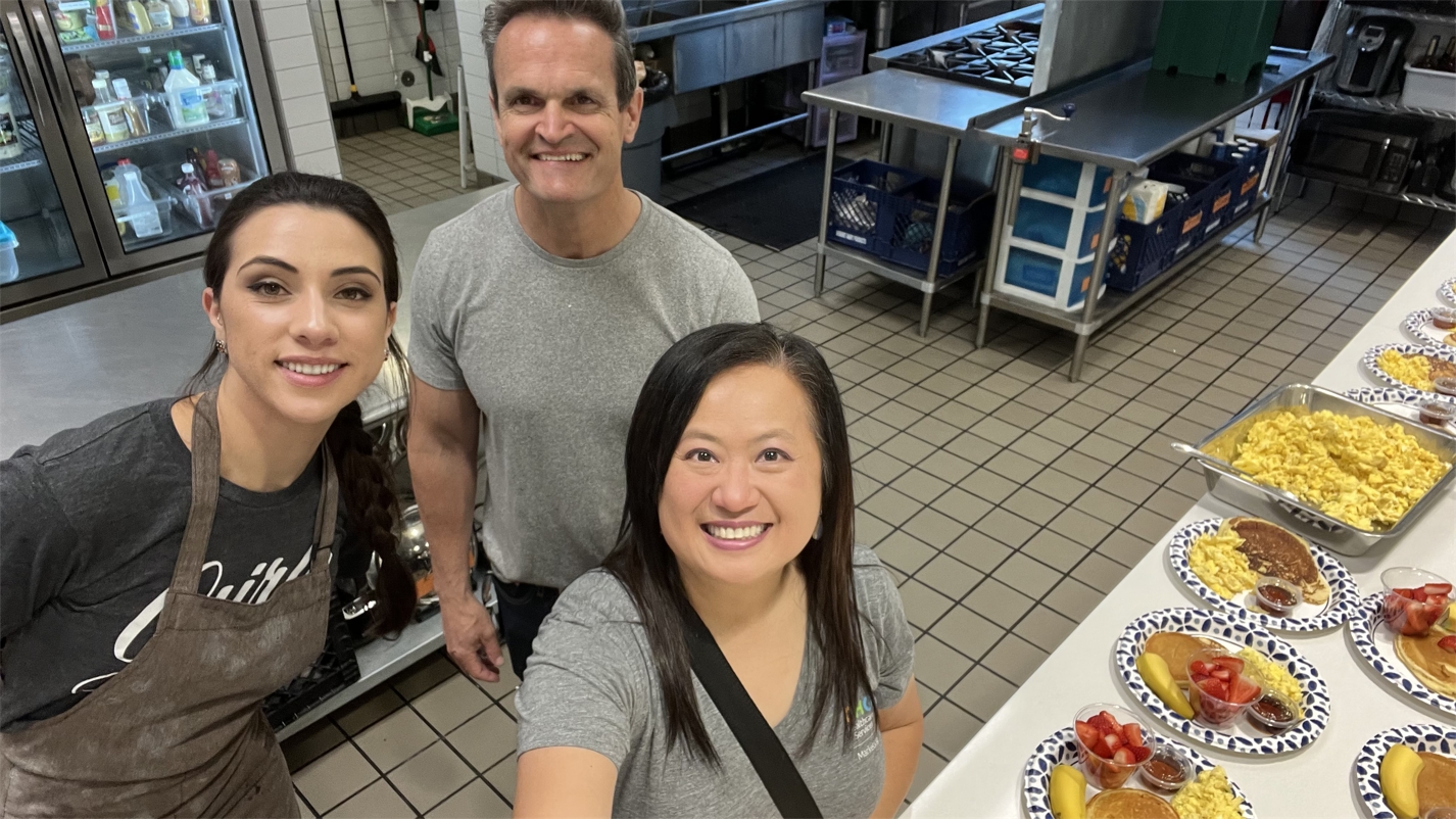 At CHG, our employees use their VTO time to serve those in need. Here our creative team makes meals for members of the community..jpeg