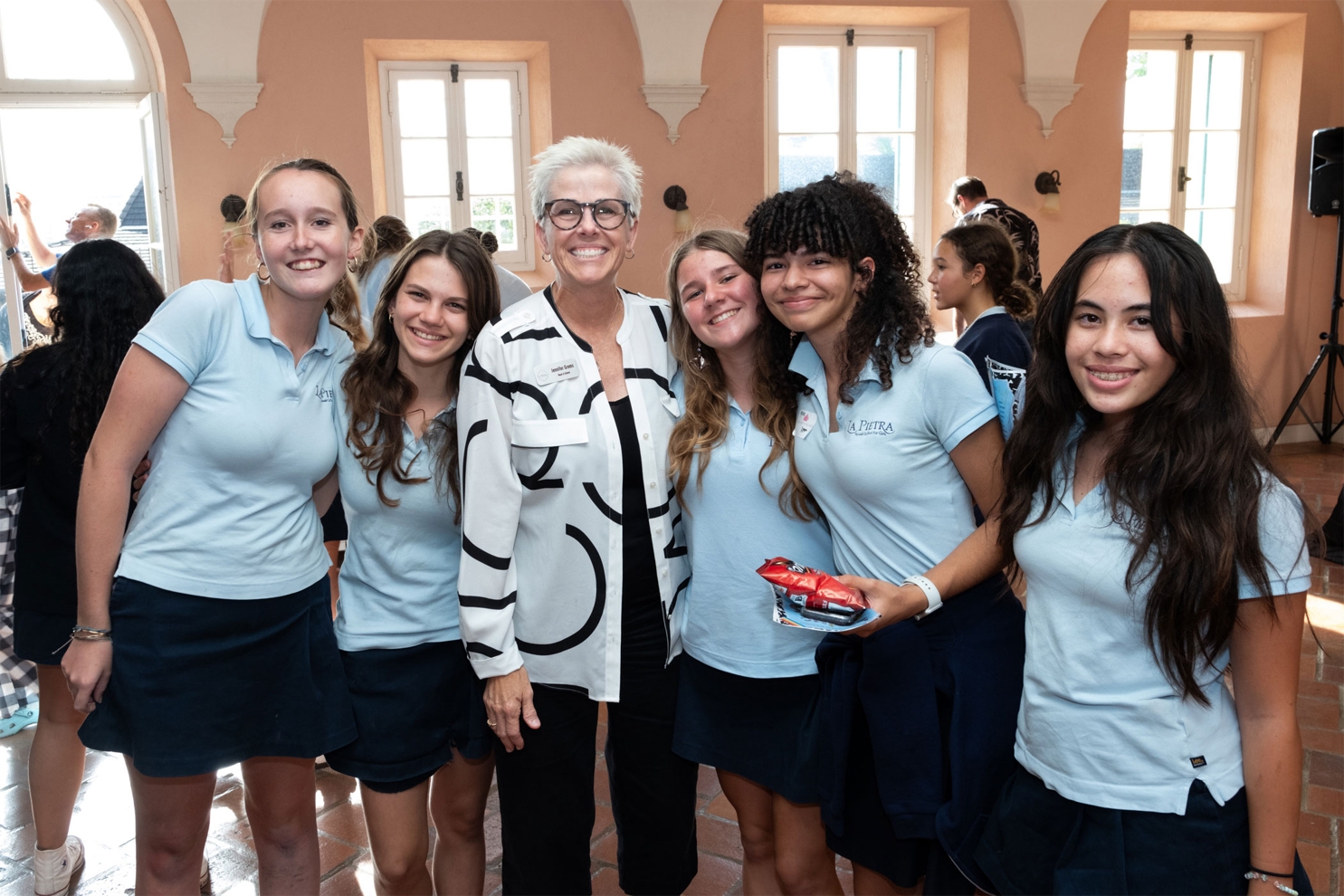 Head of School Jennifer Grems with students.