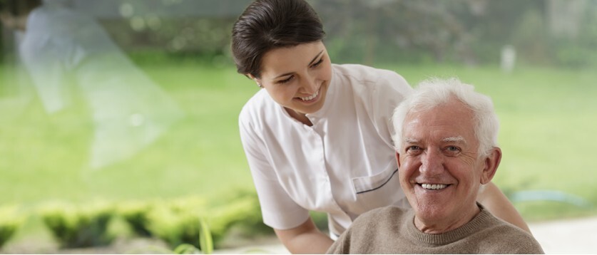 CG smiling with elderly man - Copy.jpg