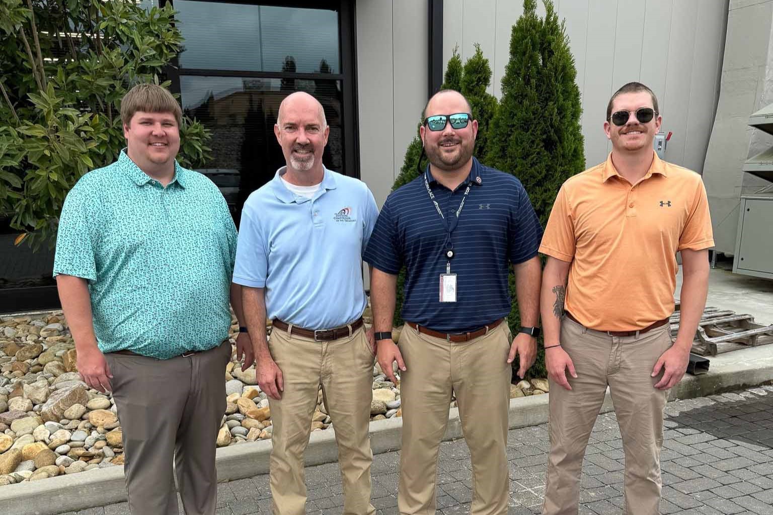 Knoxville staff faceoff at the annual Cornhole Tournament.