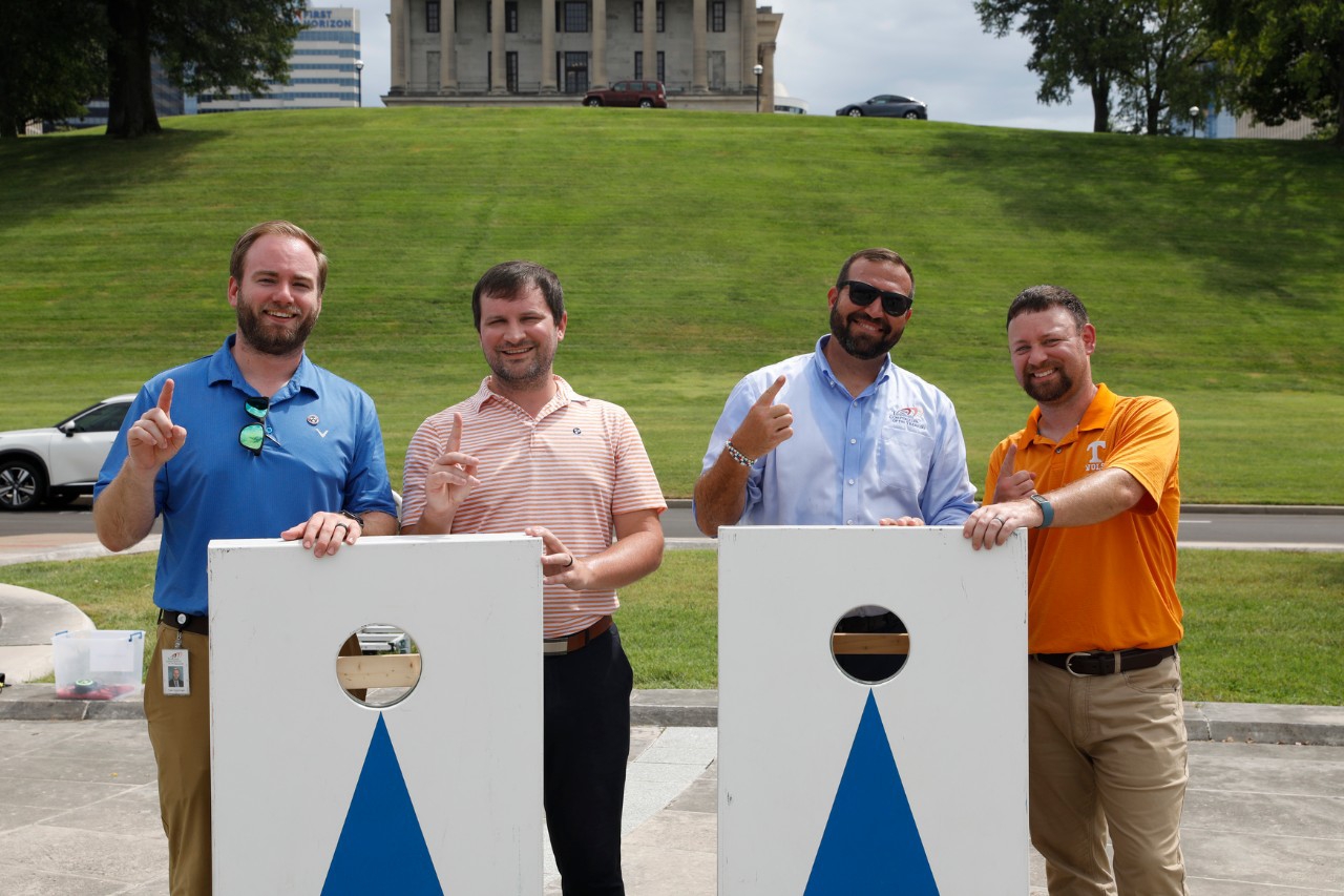 Staff from the Comptroller’s Nashville office work hard and play hard as they prepare to faceoff in a game of cornhole.
