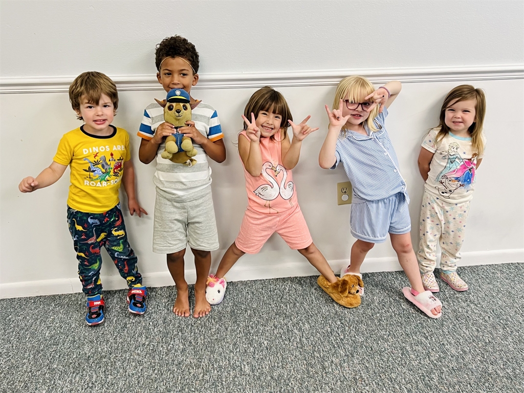 Cozy and ready for learning! These little scholars rock their PJs for Pajama Day at school.