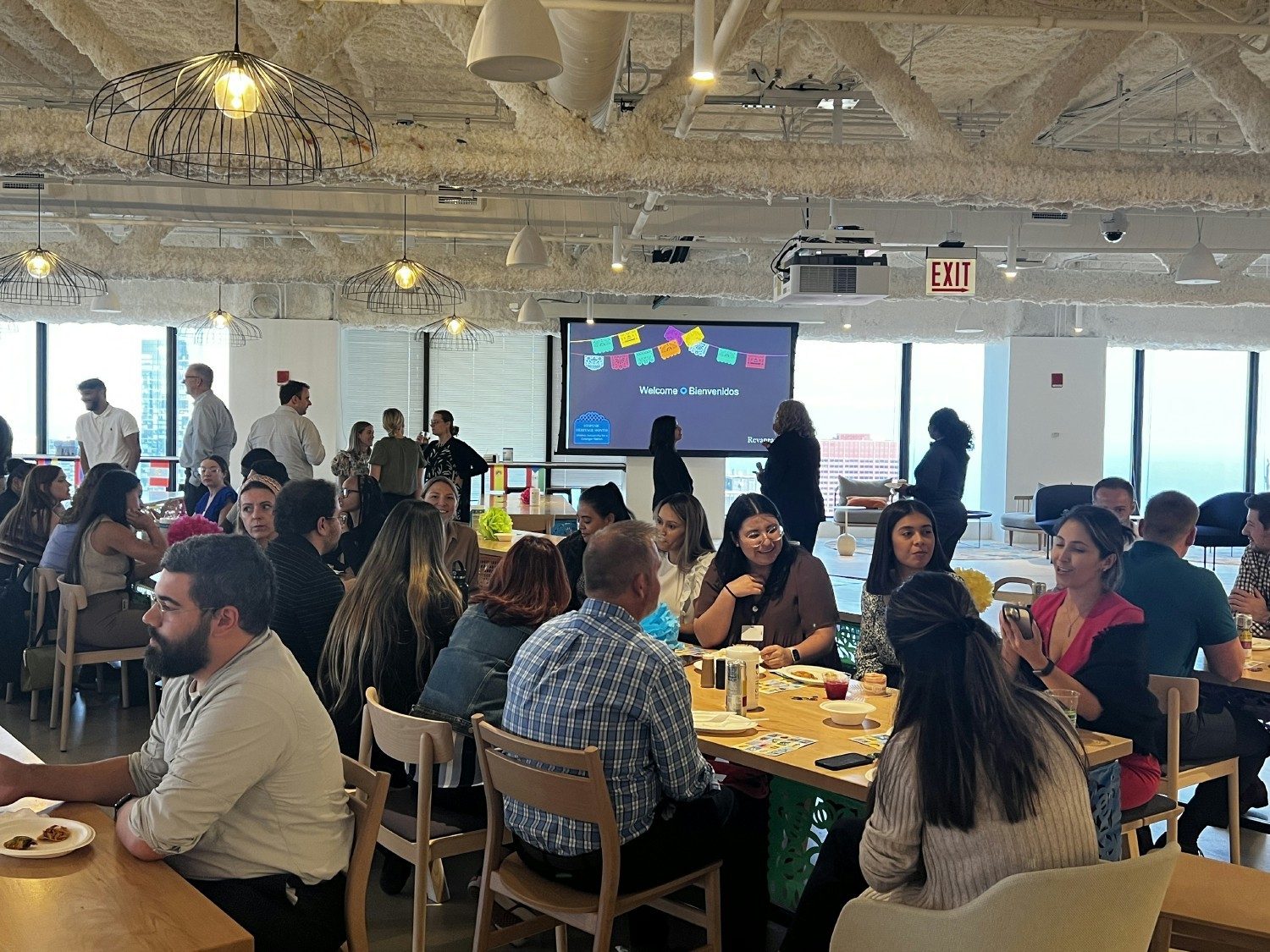 Employees gathered in celebration of Hispanic Heritage Month with food, drinks and loteria!