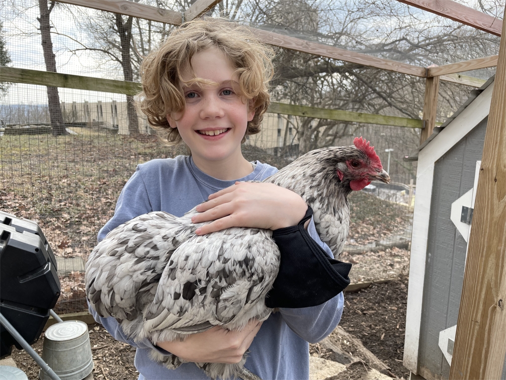 Students care for the Earth as well as for our flock of hens and honey bees. Understanding where things come from (like eggs, honey, and veggies) and how they come to be is at the heart of connecting to and loving our Earth.