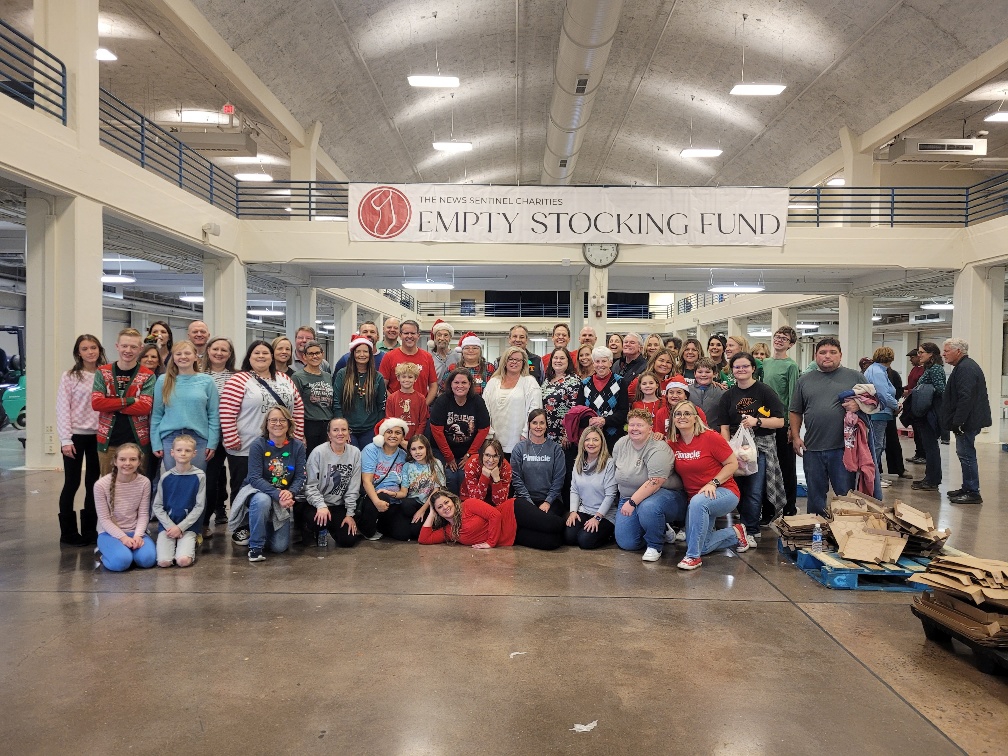 One of associates' favorite volunteer activities is helping pack up gifts and food for the News-Sentinel Charities' Empty Stocking Fund.