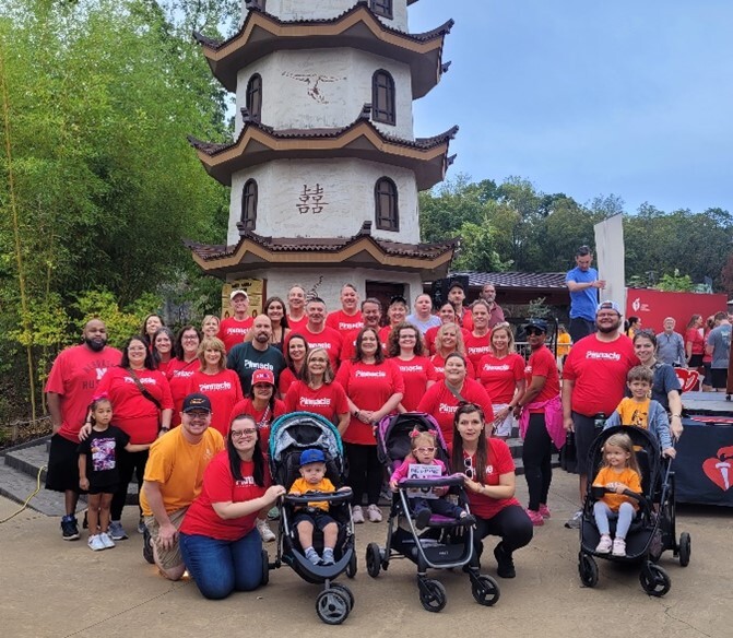 Pinnacle associates have incentives to participate in the firm's wellness programs, receiving discounted premiums for "silver" status based on collecting points and "bucks" for specific activities that improve health. This group participated in the Heart Association's walk to support the nonprofit and get points for the wellness program.