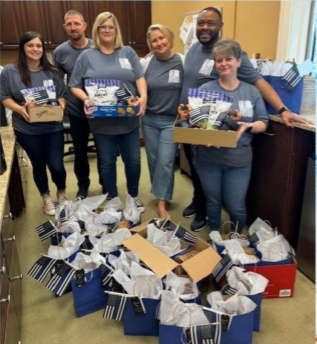 Associates in Pinnacle's Locust office are ready to deliver goodie bags to the area's three police stations to show appreciation during National Law Enforcement Appreciation Week..PNG