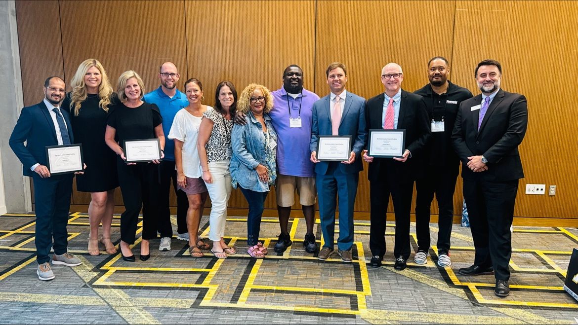 Pinnacle asociates support one another's accomplishments, like these graduates of the NC School of Banking.jpeg
