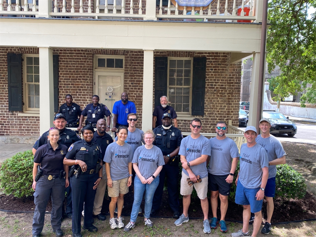 Hands-on volunteering is a big part of Pinnacle's Make a Difference Day each April, like with this team that partnered with police in the Wilson Street project.