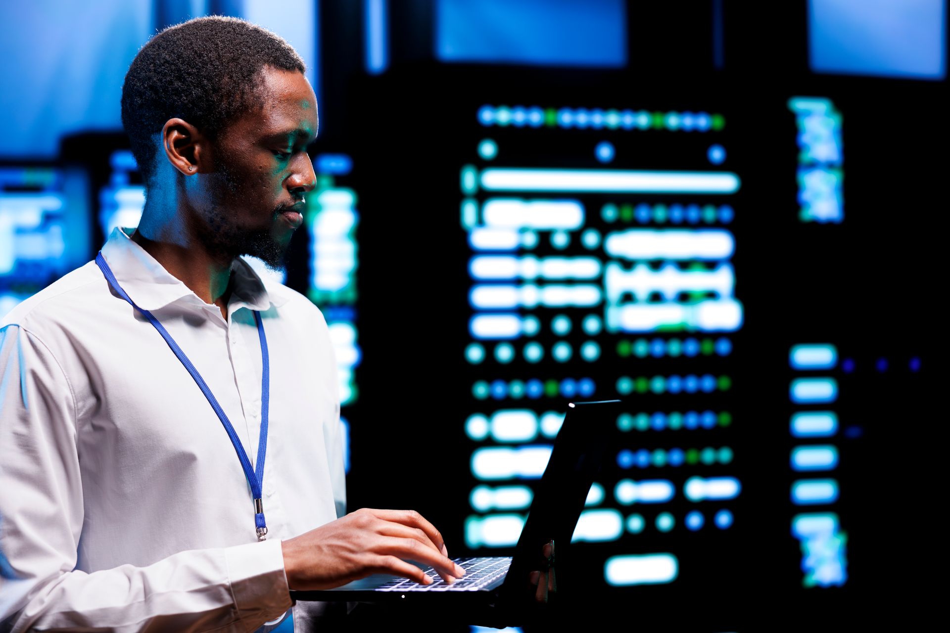 engineer-inspects-blade-servers-2023-11-27-05-30-04-utc.jpg