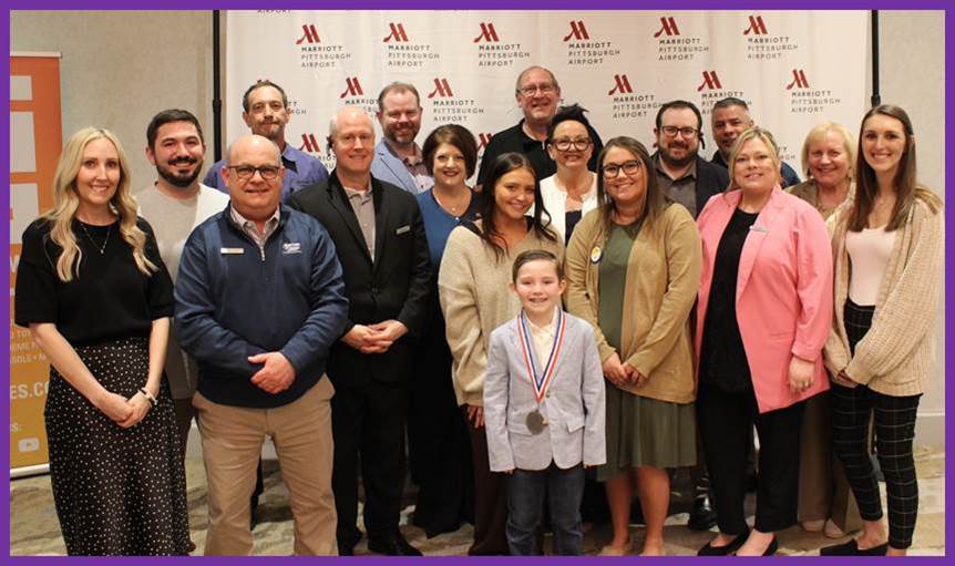 Jordy with the Team.jpg