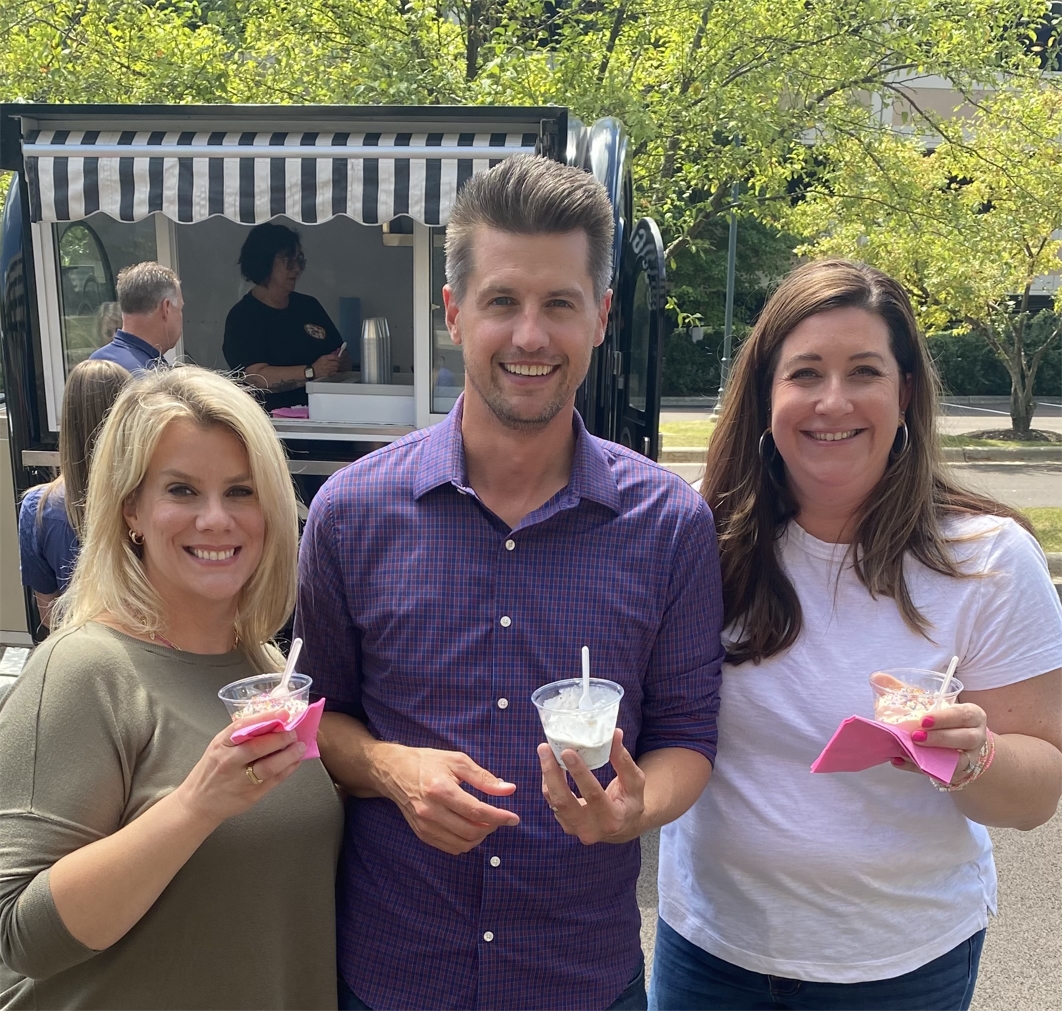 Colleagues cool off during the summer with a n onsite visit from a gelato truck.