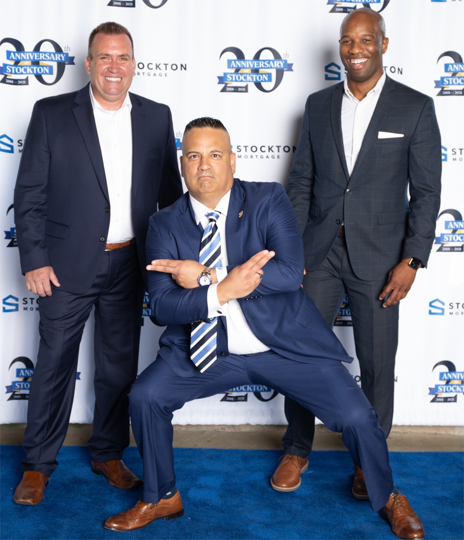 Executives, Kris Vanzant, Jeff Ratanapool, and Anthony Whiteside, having fun on the blue carpet..