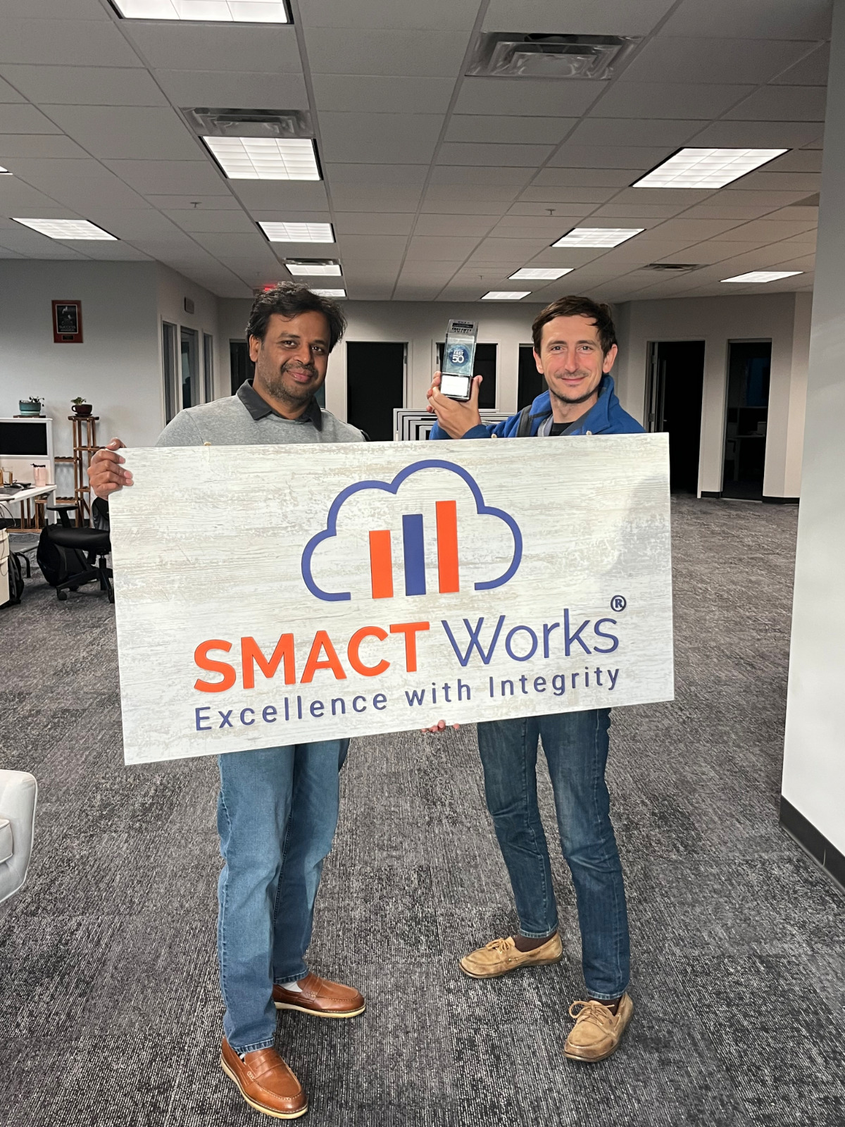 Doug and Sudhakar SMACT sign.png