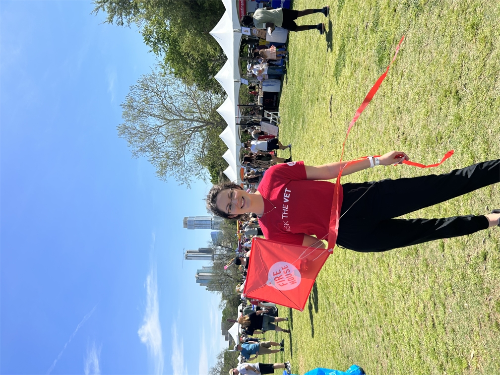 Dr Brianna Armstrong, Medical Director at Firehouse 183, gets ready to fly her kite at this year's ABC Zilker Kite Fest - April 2023.jpg