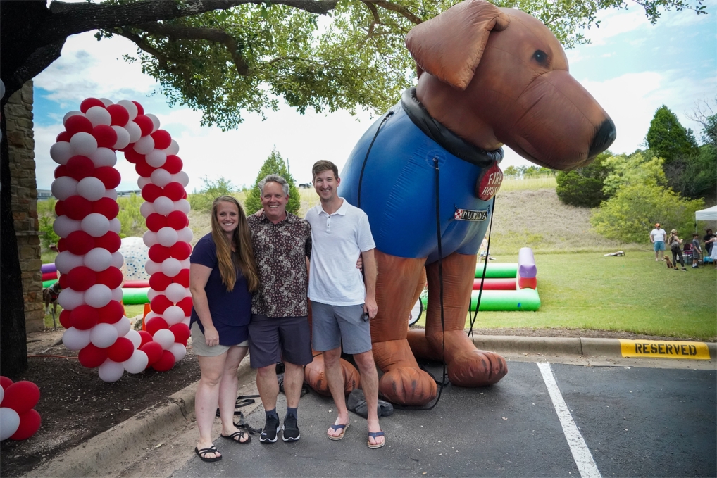 Co-founders of Firehouse Animal Health Centers -- Dr Jed Rogers (left) and Dr John Faught (right) with Kelly Erb (Director of Operations) at Firehouse's 10 year anniversary party in May 2022.jpg