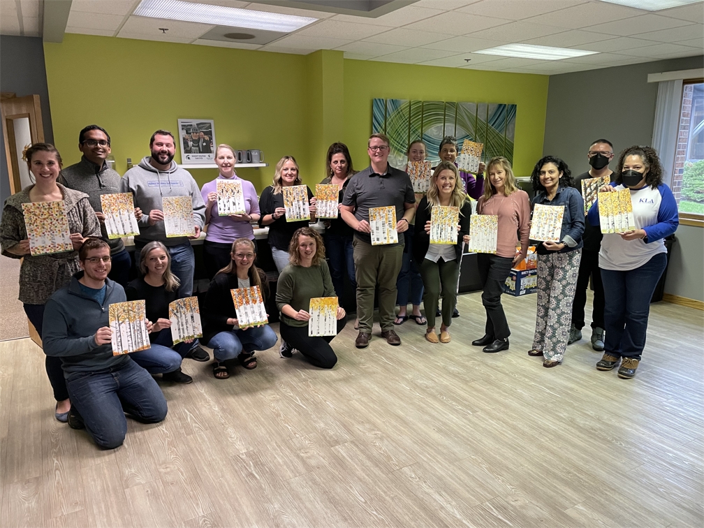 KL&A employees and family showing up their artwork from one of the after hour painting events.