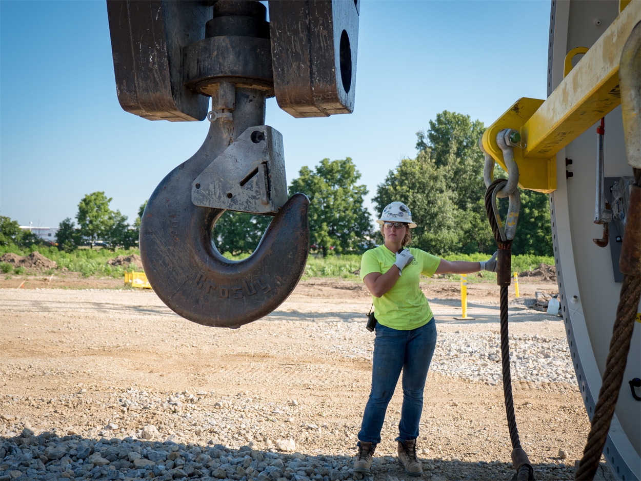 One Energy performs development, engineering, procurement, construction, operations, and finance activities in-house. Pictured is a One Energy technician, at work on a project site.