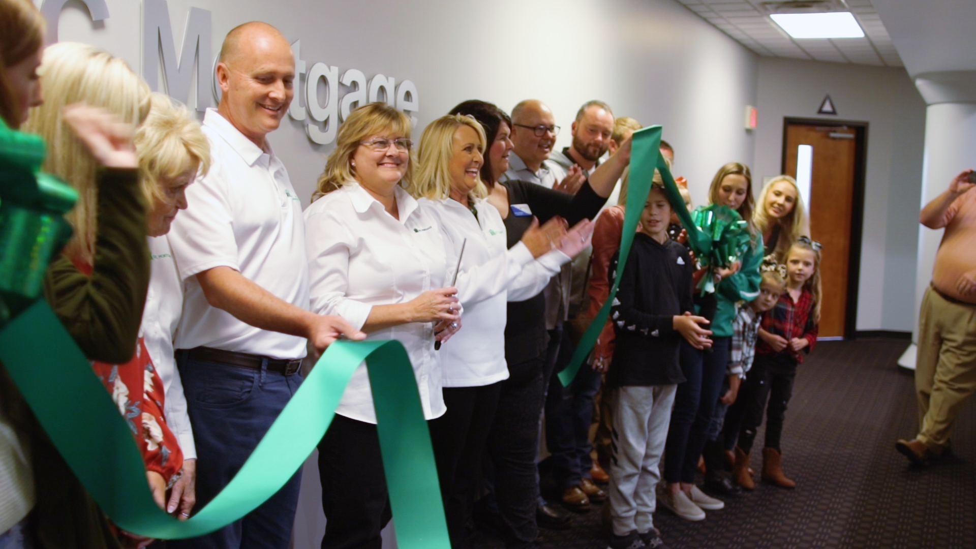 Ribbon cutting at new corporate office location