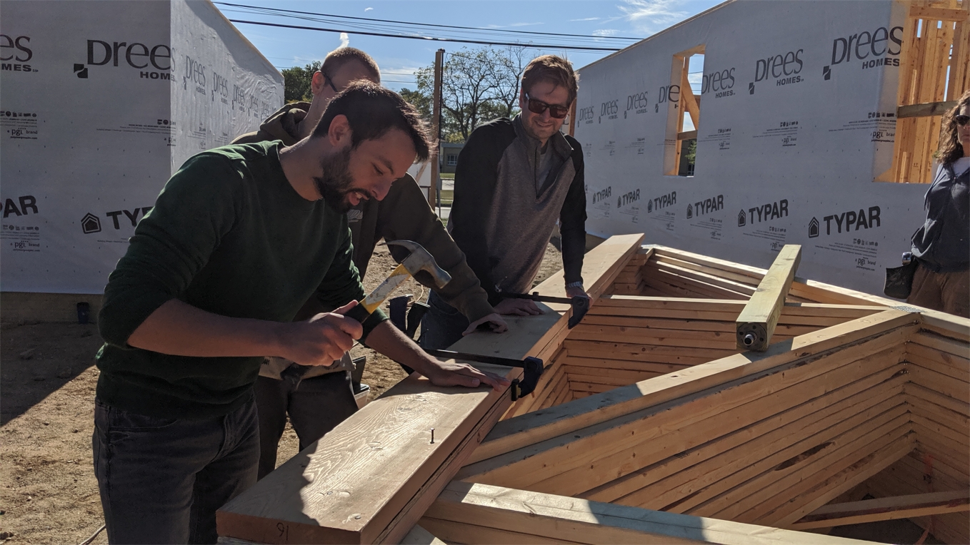 The Etactics team volunteering for Habitat for Humanity for Summit County (Before COVID-19).