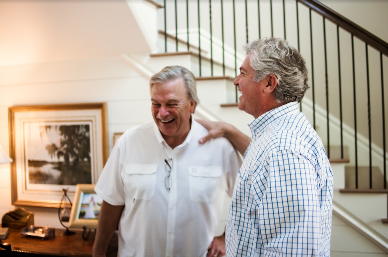 Our founder, David Rhodes, with a friend and client.