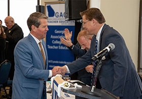 Prior to making remarks, Georgia Governor Brian Kemp shakes PAGE Executive Director Craig Harper's hand at the 2020 PAGE Day on the Hill, held annually during the legislative session.