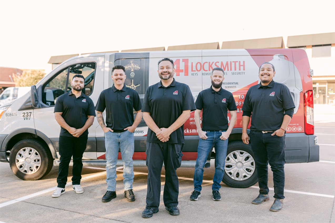 Tech Group Pic in Front of Van Smiling.jpg