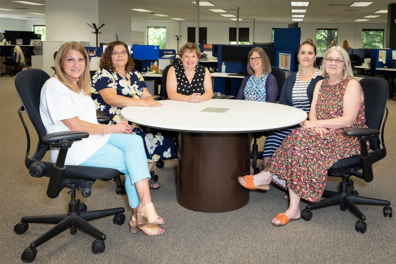 Team meeting at Nassau Financial Group's service and operations center in East Greenbush NY