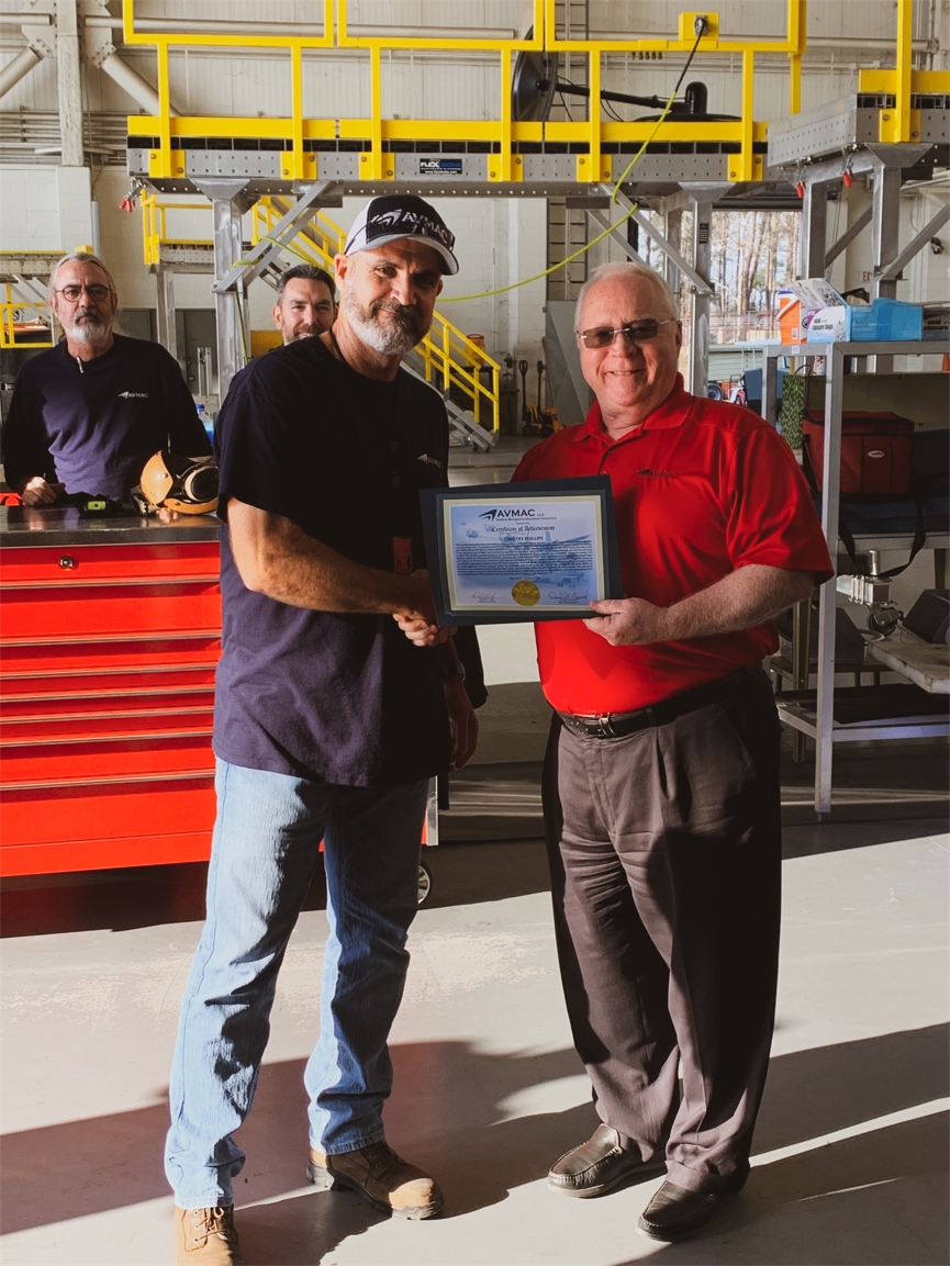 Larry King, Director of Operations, presenting AVMAC's Employee of the Quarter award to Tim Phillips.jpg