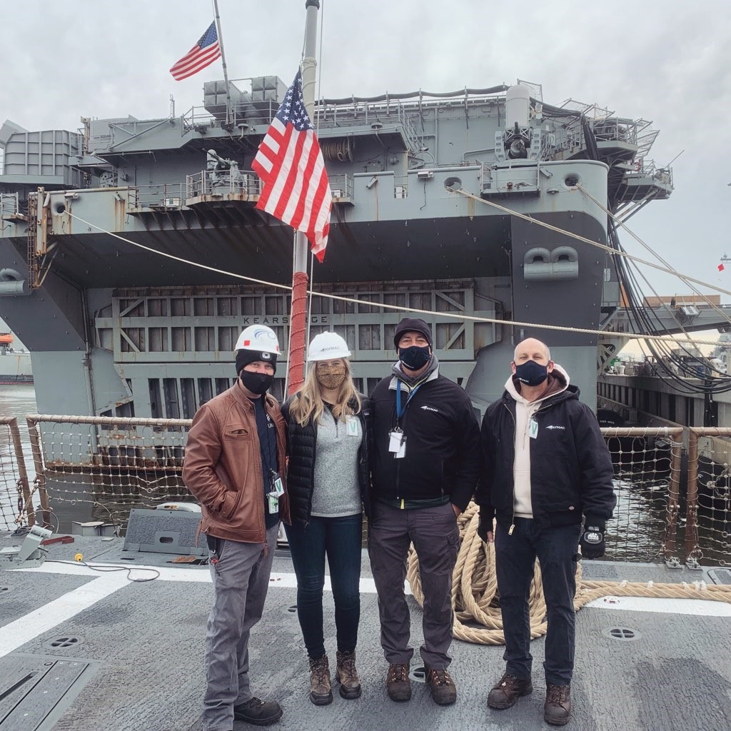 Katie Leahy, Business Director with Ship Integration Associates Bill Barnett and Keith Cole (on right) assessing flight deck systems on a DDG ship.   Deck repair team